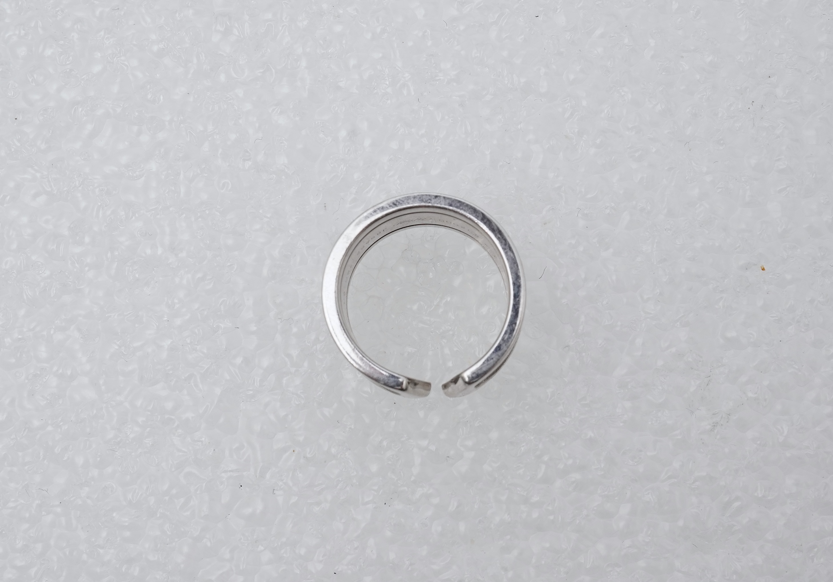 Cartier, a white gold ring, 'C de Cartier', circa 2000